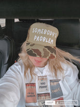Load image into Gallery viewer, SOMEBODY&#39;S PROBLEM CAP: CAMO
