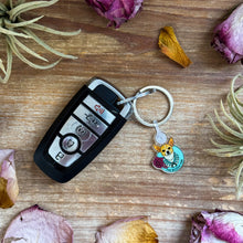 Load image into Gallery viewer, Bijoux FAB Character Keychain – Fabienne, Devon &amp; Trouble
